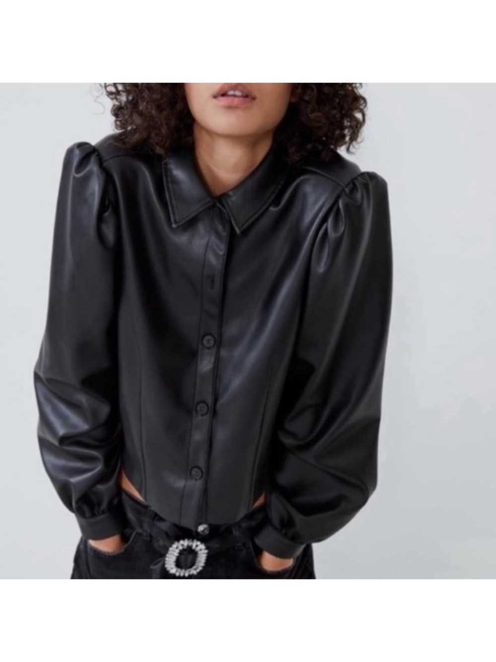 ZARA Black Faux Leather Collared Jacket
Sleek faux leather jacket by ZARA.